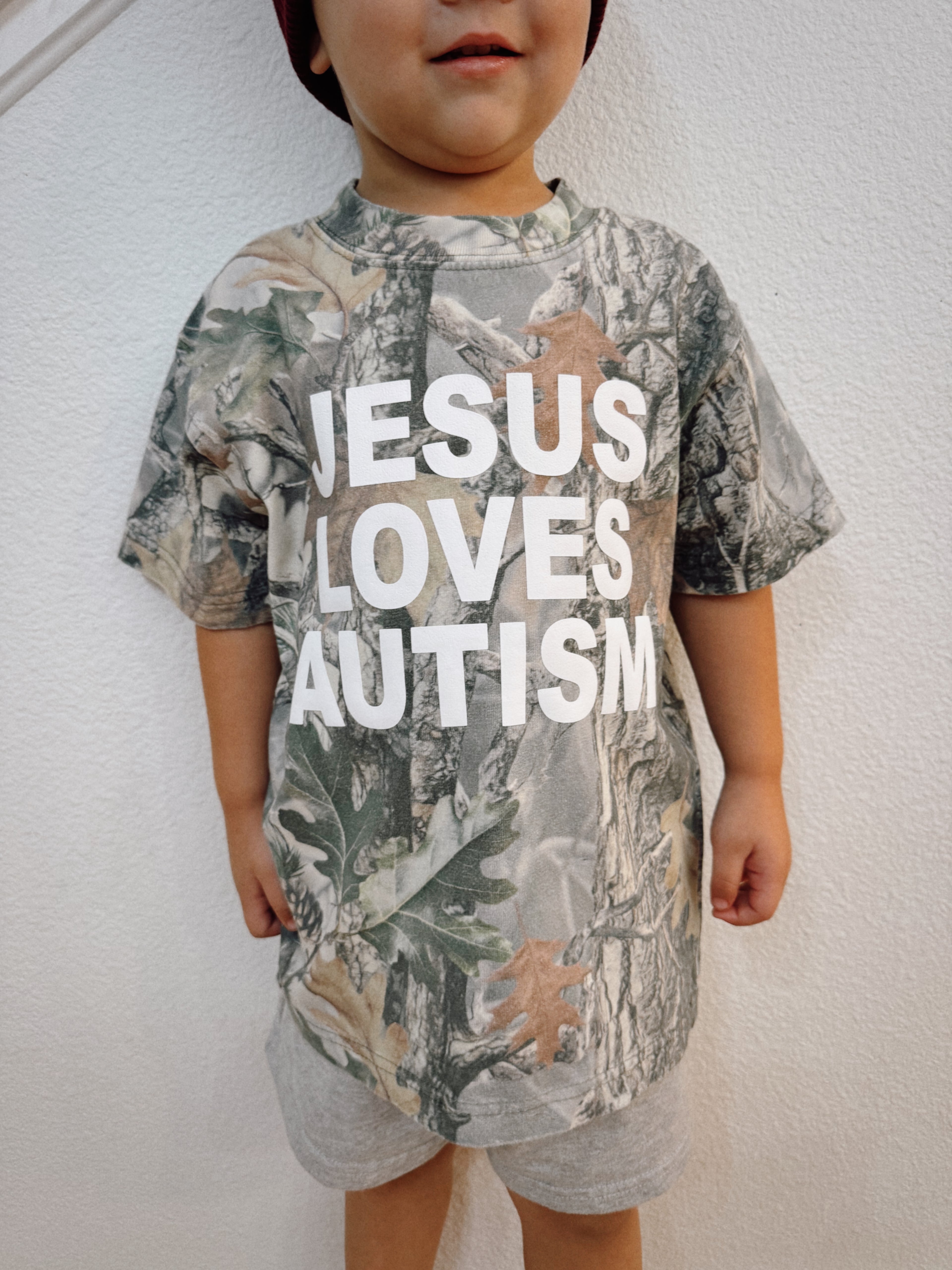 Kids Vintage Camo “Jesus Loves Autism” Cotton Collective T-Shirt