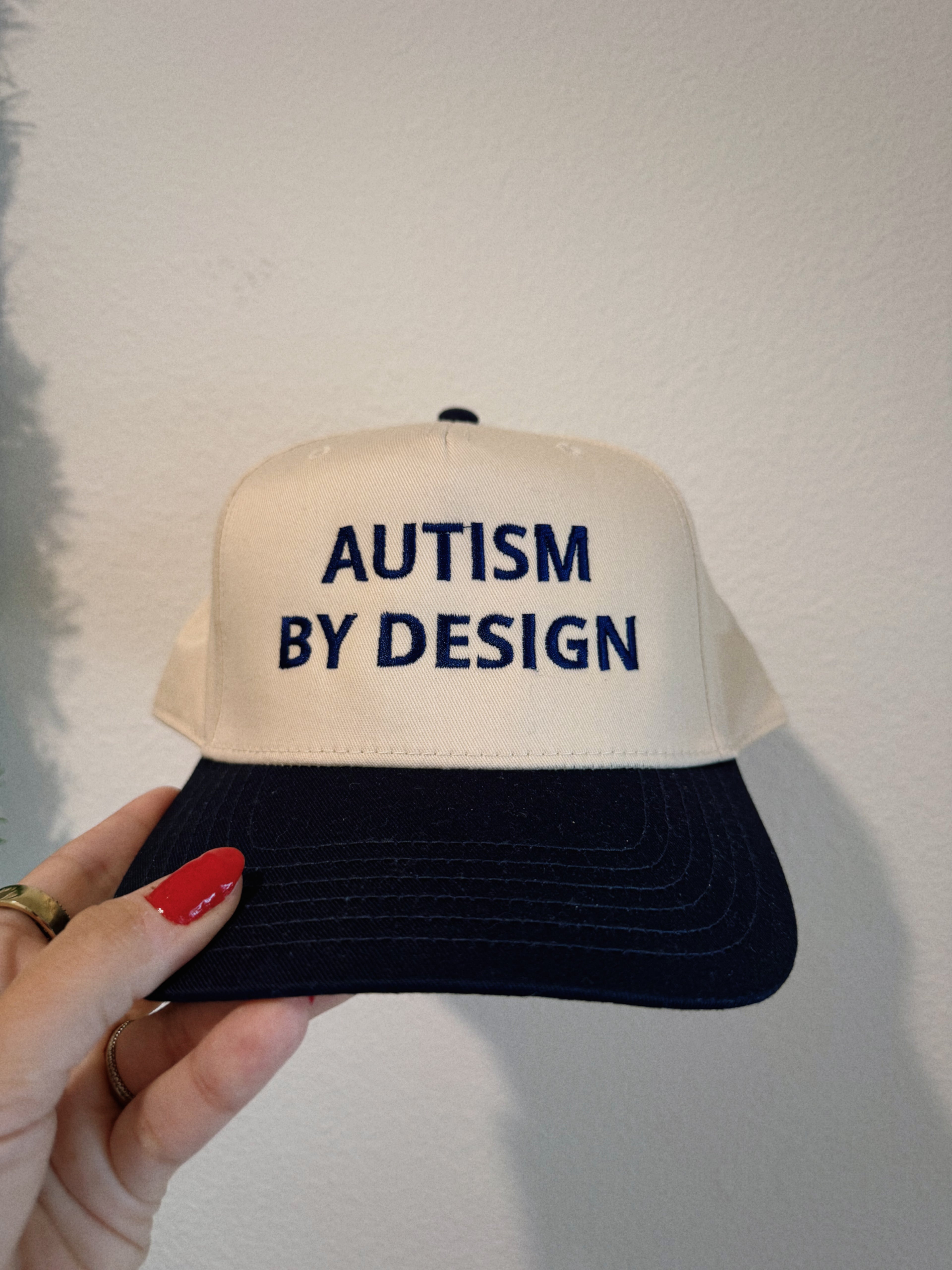 Embroidered "Autism By Design" Hat in Navy